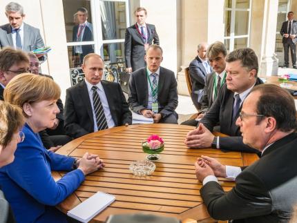 Merkel and Putin’s Wrestling Match