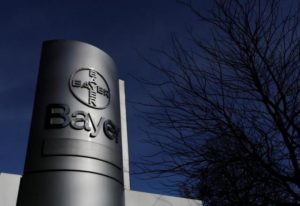 The logo of Bayer AG is pictured at the Bayer Healthcare subgroup production plant in Wuppertal, Germany February 24, 2014. REUTERS/Ina Fassbender/File Photo
