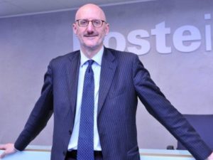 Francesco Caio, AD di Poste Italiane