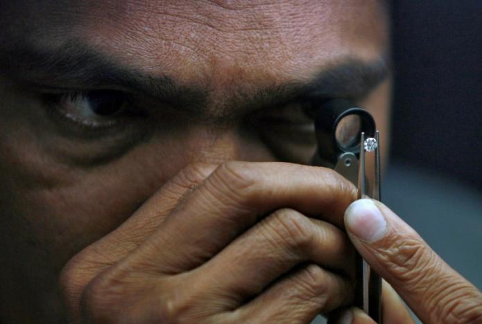 Global diamond business roiled as cash crunch hits Indian stone cutting Global diamond business roiled as cash crunch hits Indian stone cutting