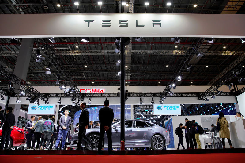 Tesla to raise $2 billion from share, debt issues