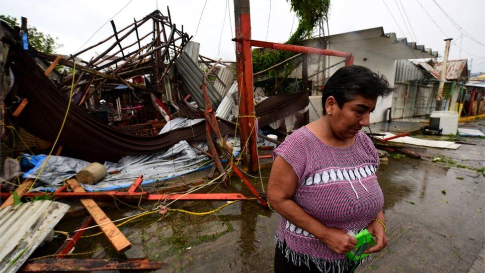 Hurricane Grace kills eight as it rips through eastern Mexico