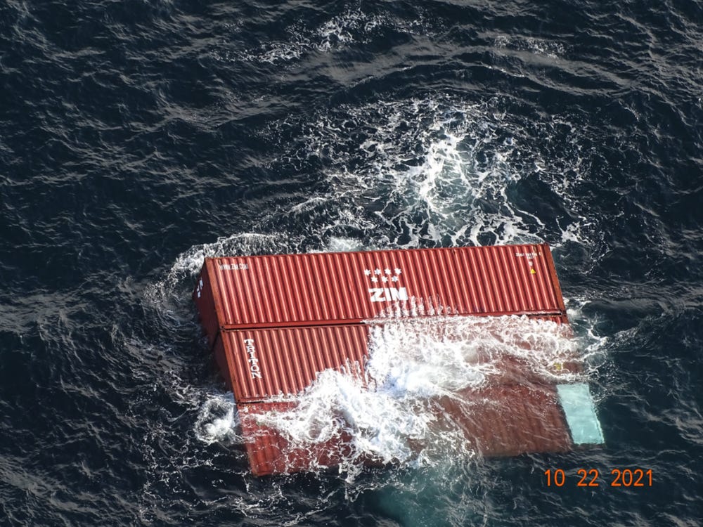 A fire broke out on a cargo ship after about 40 shipping containers fell overboard due to rough seas off the coast of Vancouver Island